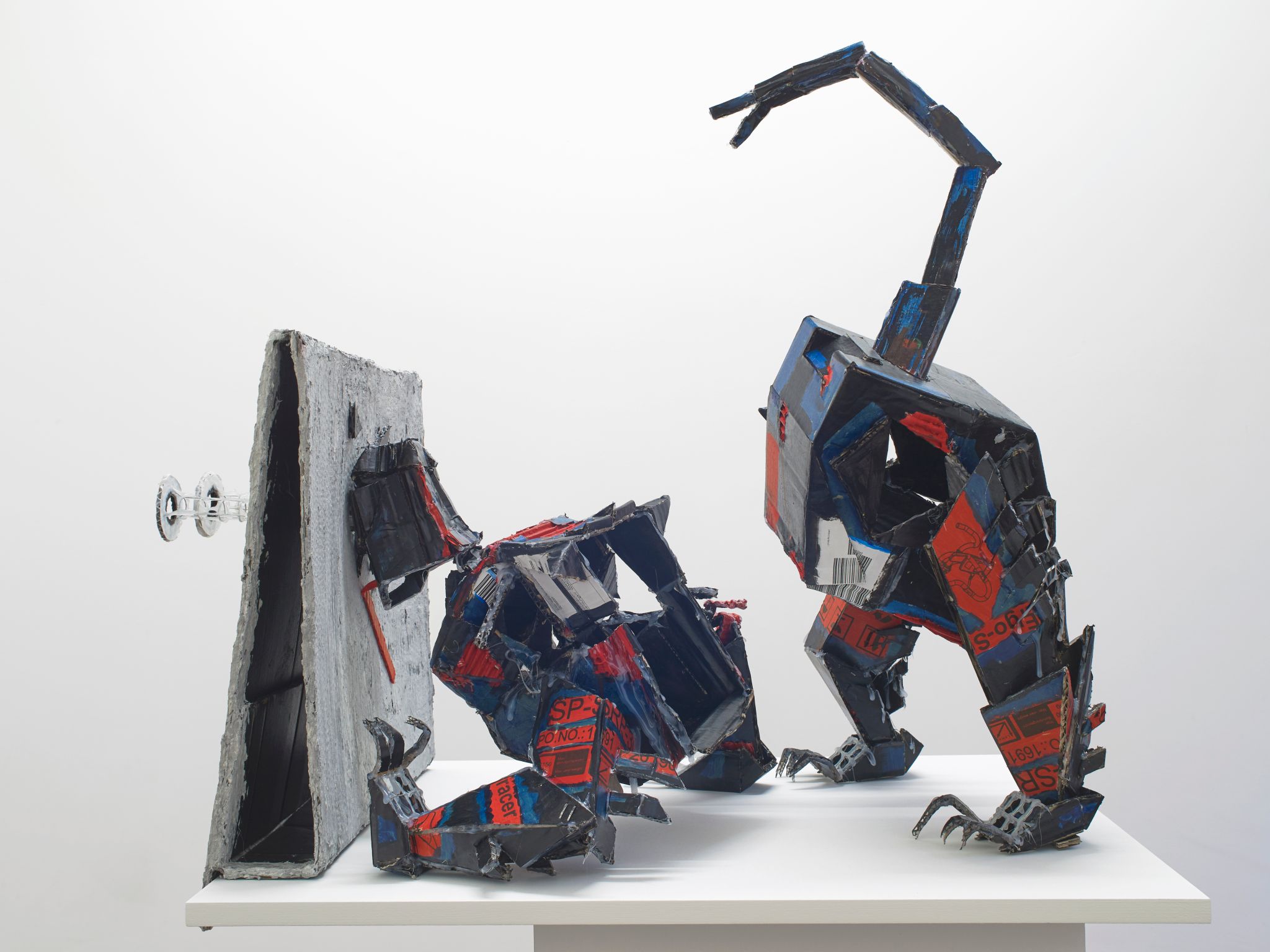 Jonathan Penca, Solid Compact Kat ascending striding, 2019, Cardboard, hot glue, papier maché, ink, wire, 75 ⁠× ⁠43 ⁠× ⁠82 ⁠⁠cm