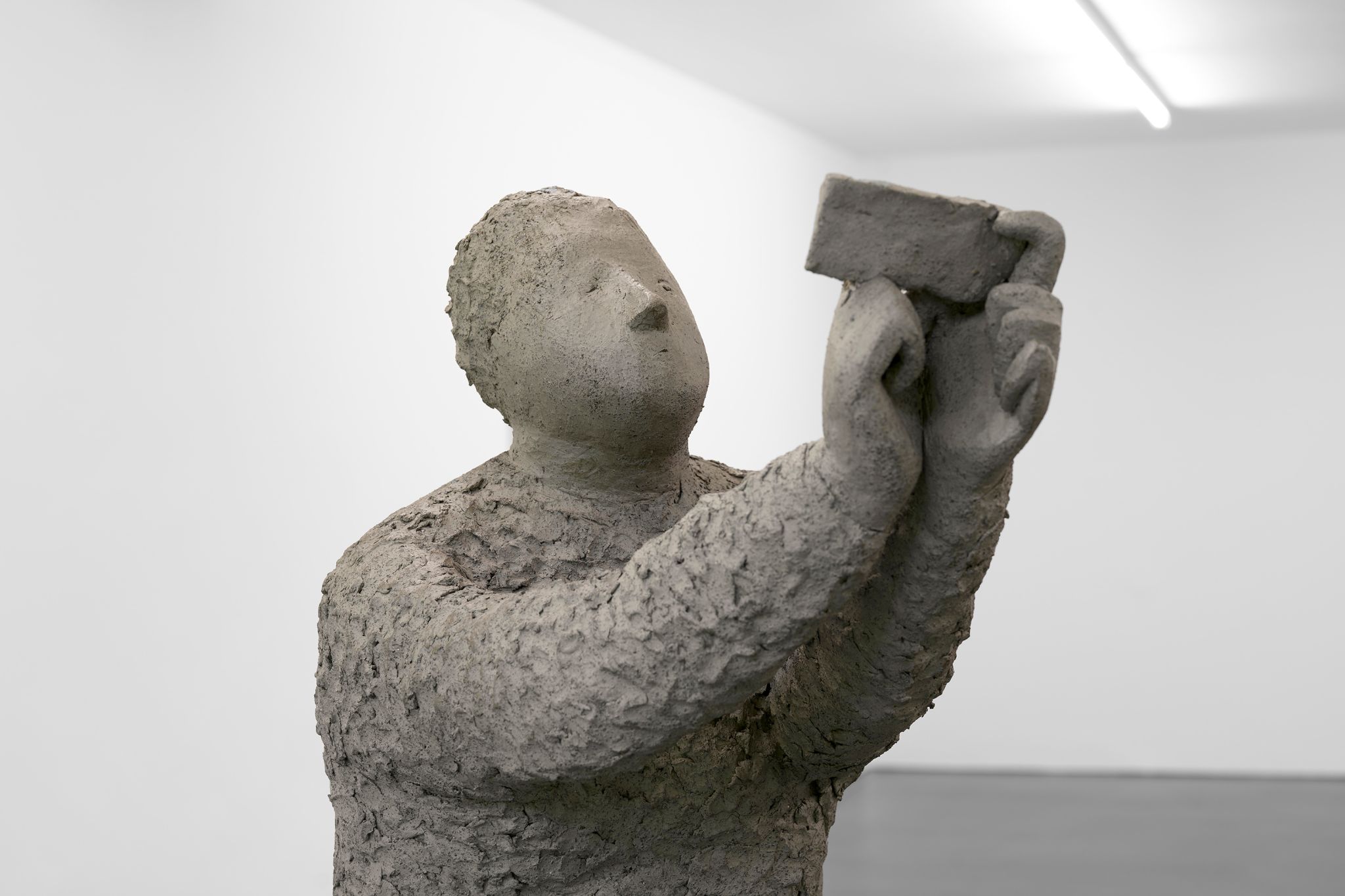 Judith Hopf, Phone User 5 (detail), 2021, Clay, concrete plinth, 170 ⁠× ⁠48.5 ⁠× ⁠67 ⁠⁠cm